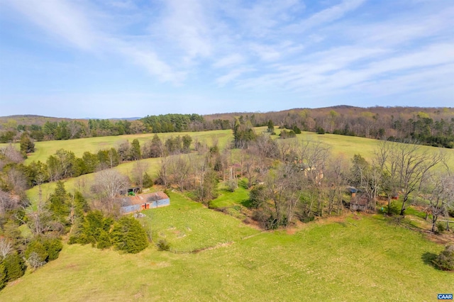 birds eye view of property featuring a rural view