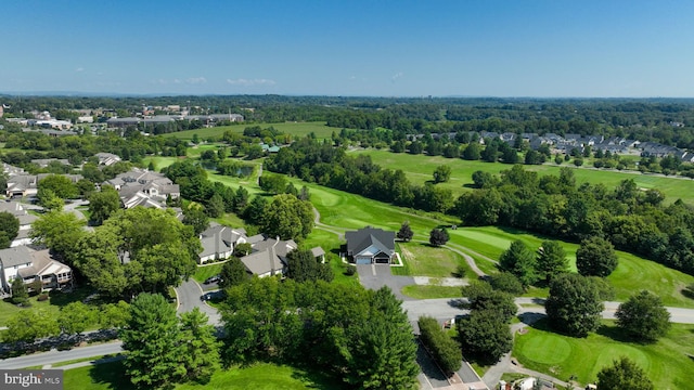 bird's eye view featuring golf course view and a residential view