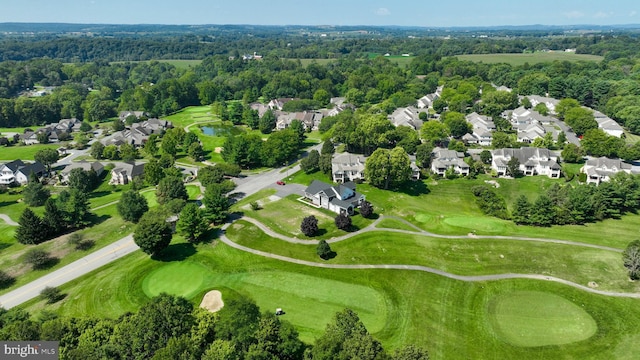 birds eye view of property with a residential view and view of golf course