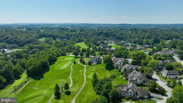 bird's eye view with view of golf course and a residential view