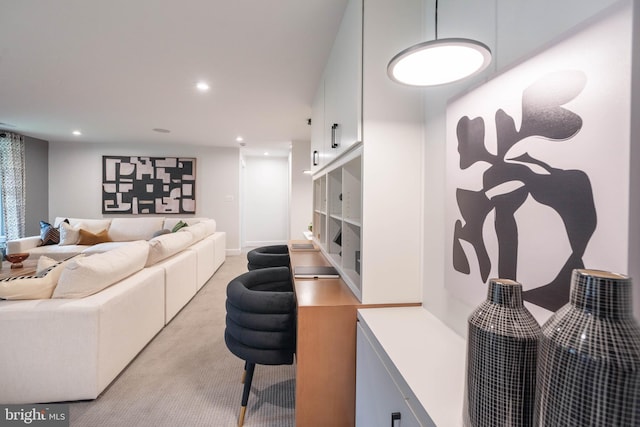 living room featuring light colored carpet