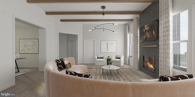 living room featuring beamed ceiling, an inviting chandelier, hardwood / wood-style floors, and a brick fireplace