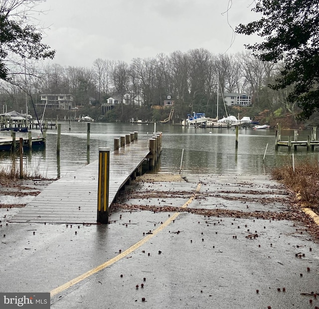 view of dock with a water view