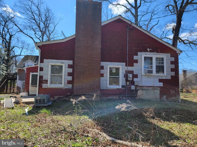 view of front facade with central air condition unit