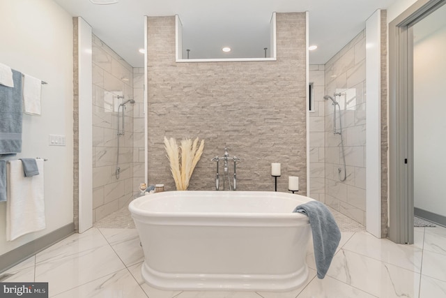 bathroom with shower with separate bathtub