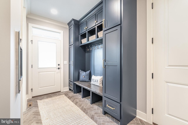 mudroom featuring ornamental molding