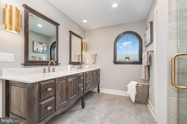 bathroom with vanity and walk in shower