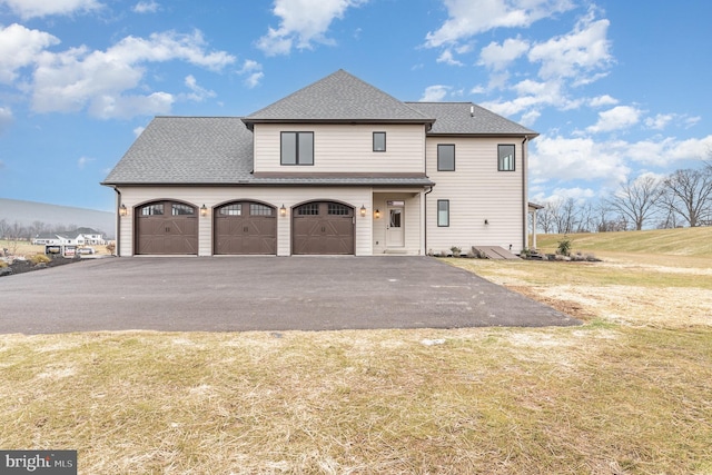 view of front of home with a front lawn