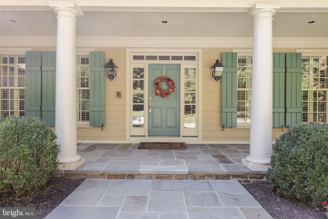 property entrance with a porch