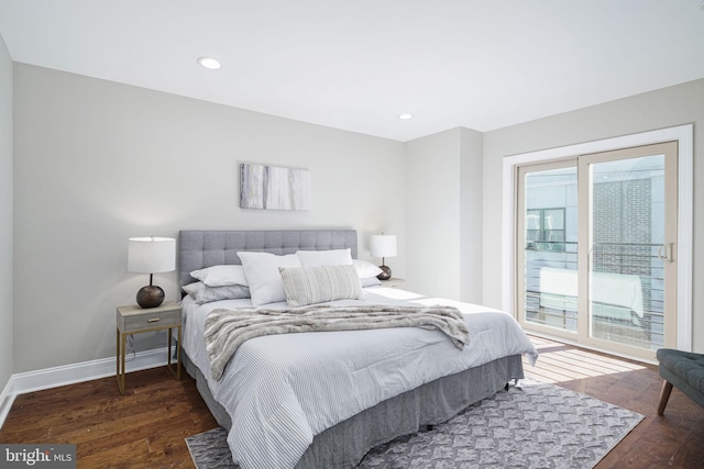 bedroom featuring access to exterior and dark wood-type flooring