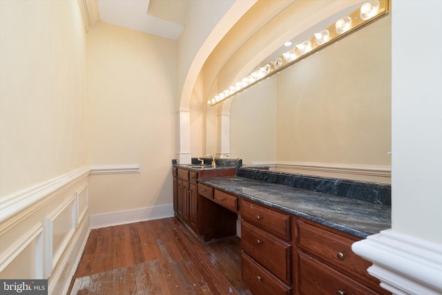 bathroom featuring hardwood / wood-style floors and vanity