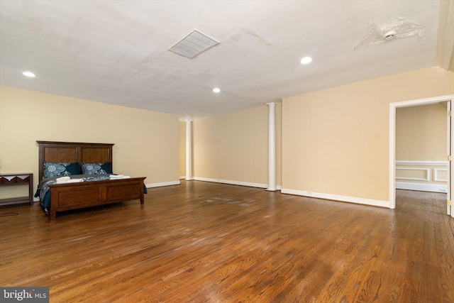 bedroom featuring dark wood-type flooring