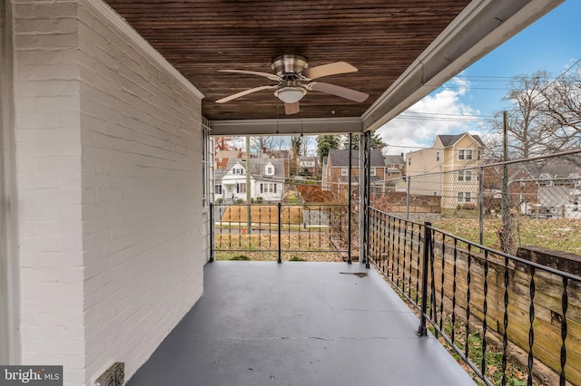 balcony featuring ceiling fan