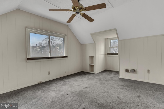 bonus room with carpet flooring, ceiling fan, and vaulted ceiling