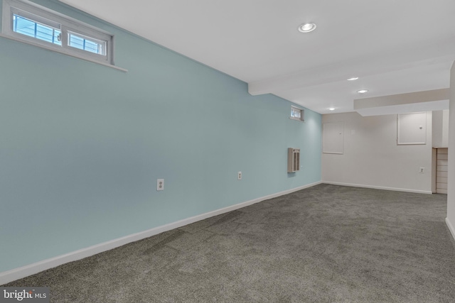 basement with dark carpet