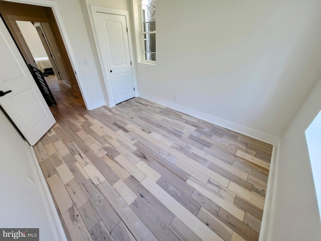 unfurnished bedroom featuring light hardwood / wood-style floors