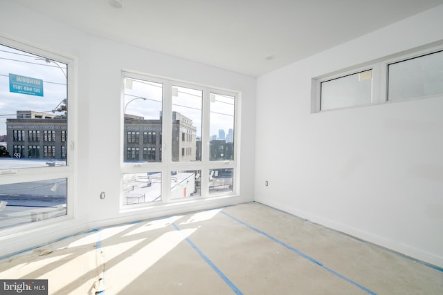 spare room featuring plenty of natural light