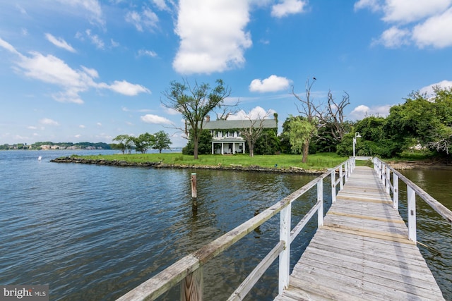 dock area featuring a water view