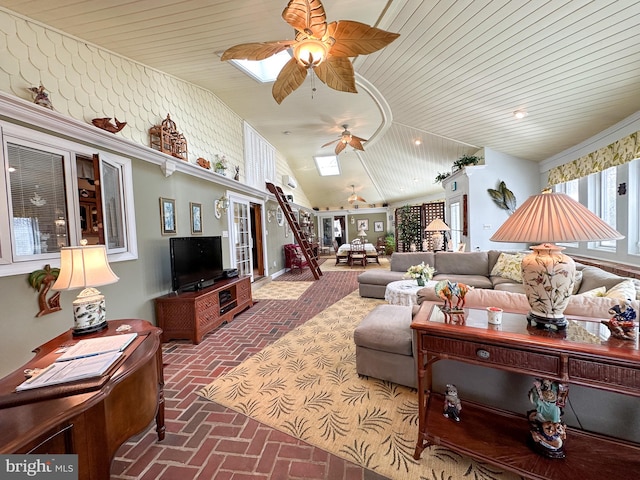 living room featuring ceiling fan, lofted ceiling, and wood ceiling