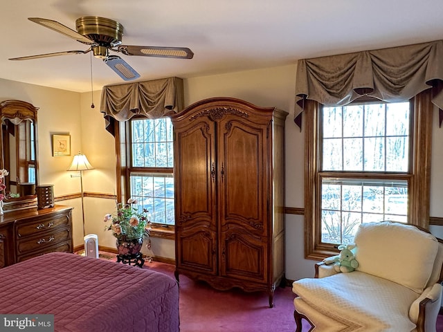 carpeted bedroom featuring ceiling fan