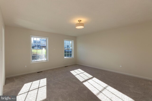 view of carpeted spare room