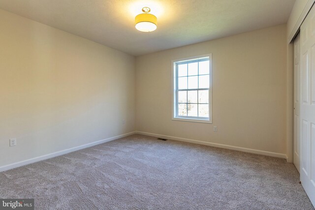 empty room featuring carpet