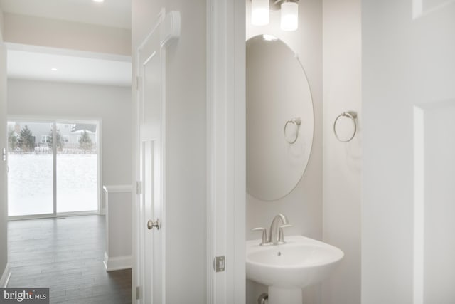 bathroom featuring hardwood / wood-style flooring and sink