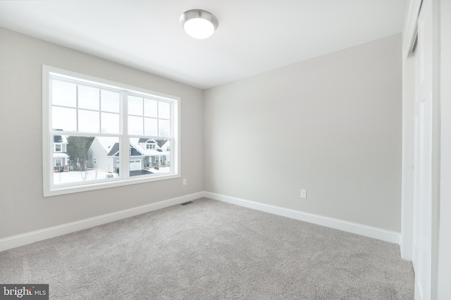 unfurnished bedroom featuring carpet flooring