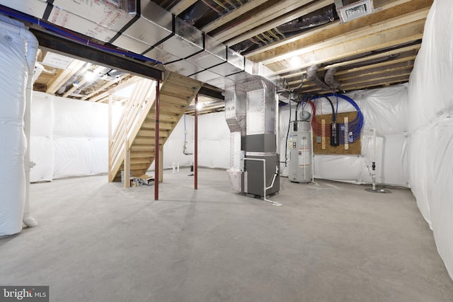 basement with heating unit and water heater