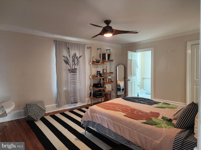 bedroom with connected bathroom, ornamental molding, ceiling fan, and dark hardwood / wood-style flooring