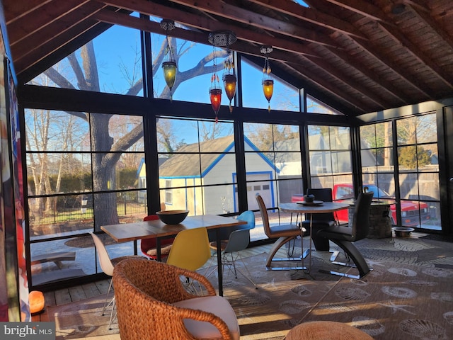 sunroom / solarium with lofted ceiling