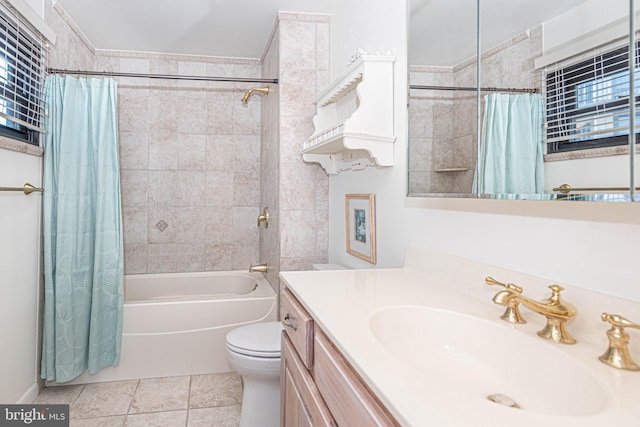 full bathroom featuring shower / bath combo with shower curtain, toilet, large vanity, and tile floors