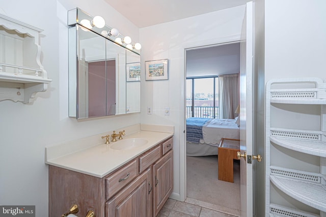 bathroom with oversized vanity and tile flooring