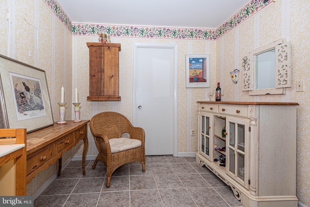 living area featuring tile flooring