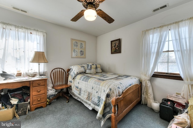 carpeted bedroom with ceiling fan