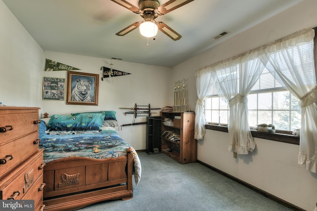 carpeted bedroom featuring ceiling fan