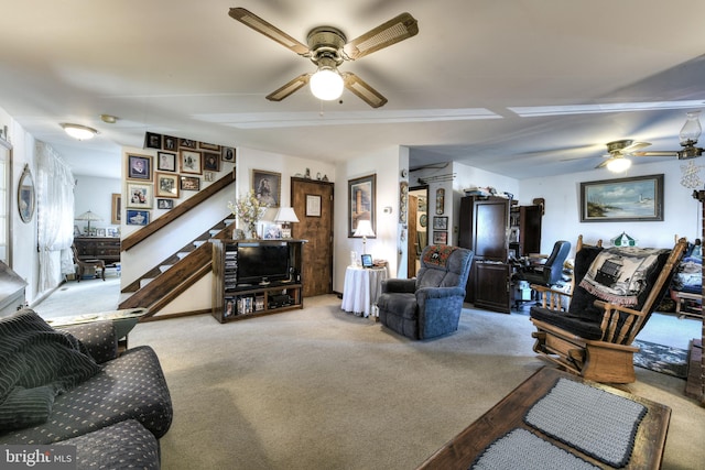 living room with ceiling fan and light carpet