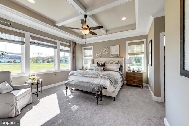 bedroom with beam ceiling, ceiling fan, coffered ceiling, light colored carpet, and ornamental molding