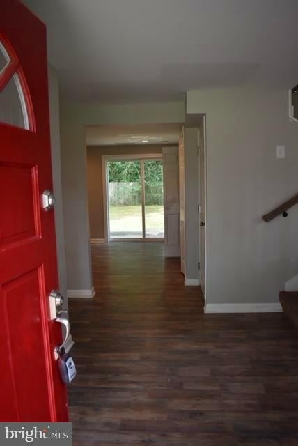 entrance foyer with dark wood-type flooring