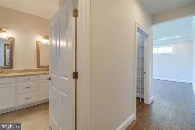 hallway featuring light hardwood / wood-style flooring