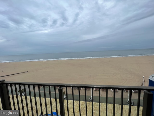 property view of water featuring a beach view