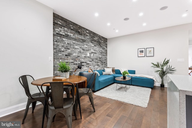 dining room with dark wood-type flooring