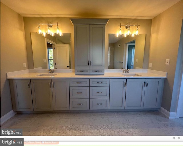 bathroom featuring dual bowl vanity and tile flooring