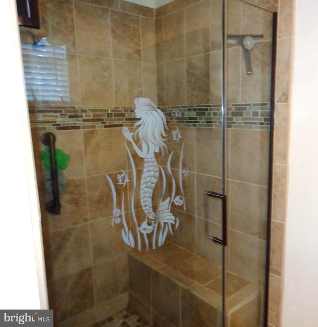 bathroom featuring walk in shower