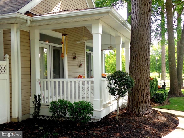 view of exterior entry with a porch