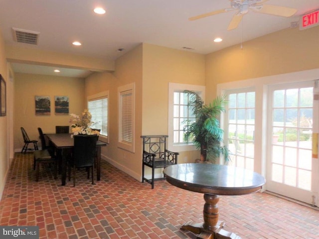 dining area with ceiling fan