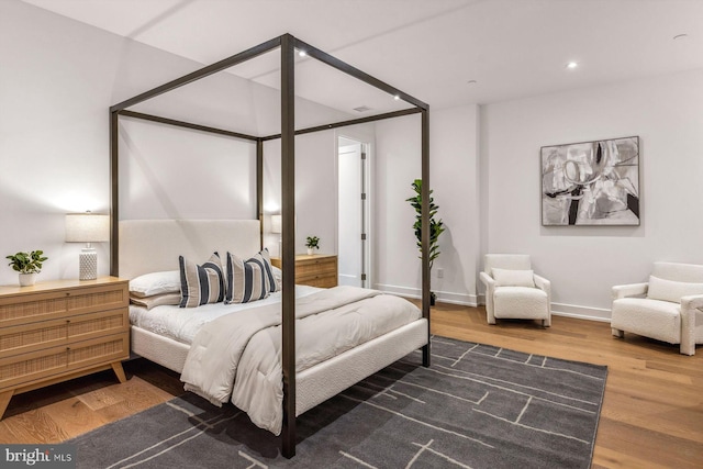 bedroom featuring hardwood / wood-style floors