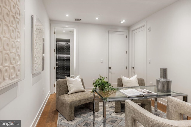 living area featuring hardwood / wood-style floors