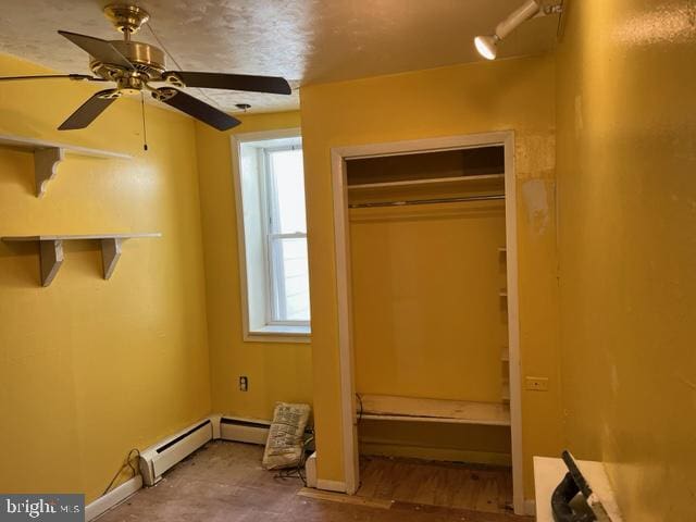 bedroom featuring a closet and ceiling fan