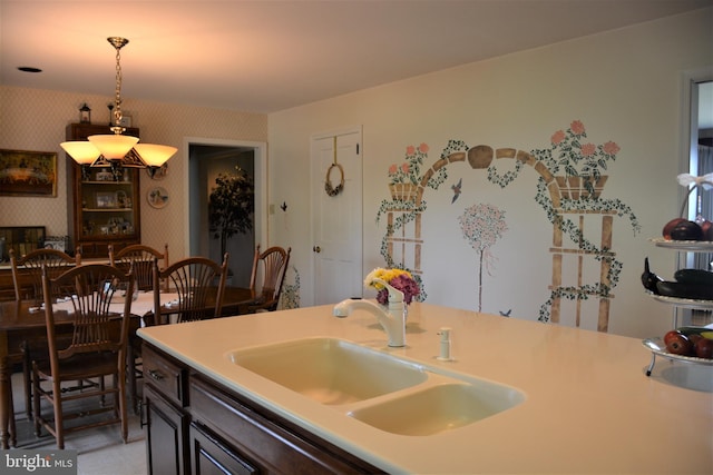 kitchen with hanging light fixtures and sink